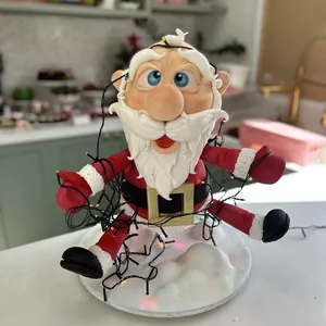 Imagem de capa para o Curso online BOLO ESCULPIDO PAPAI NOEL