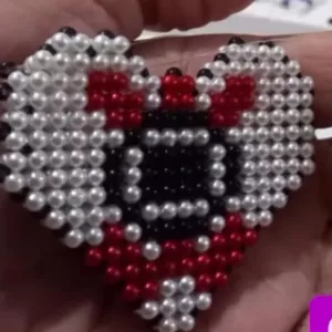 Imagem de COMO FAZER CORAÇÃO DO CORINTHIANS DE MIÇANGAS criado por Telma Luzia Rodrigues na hotmart