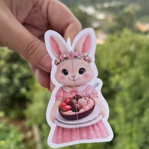 Imagem de capa para o Ebook Cartão retrovisor Coelhinhas fofas, bolo, ovo de páscoa, brigadeiro, biscoito e caixa de presente. editável no canva Cartão para divulgação retrovisor.