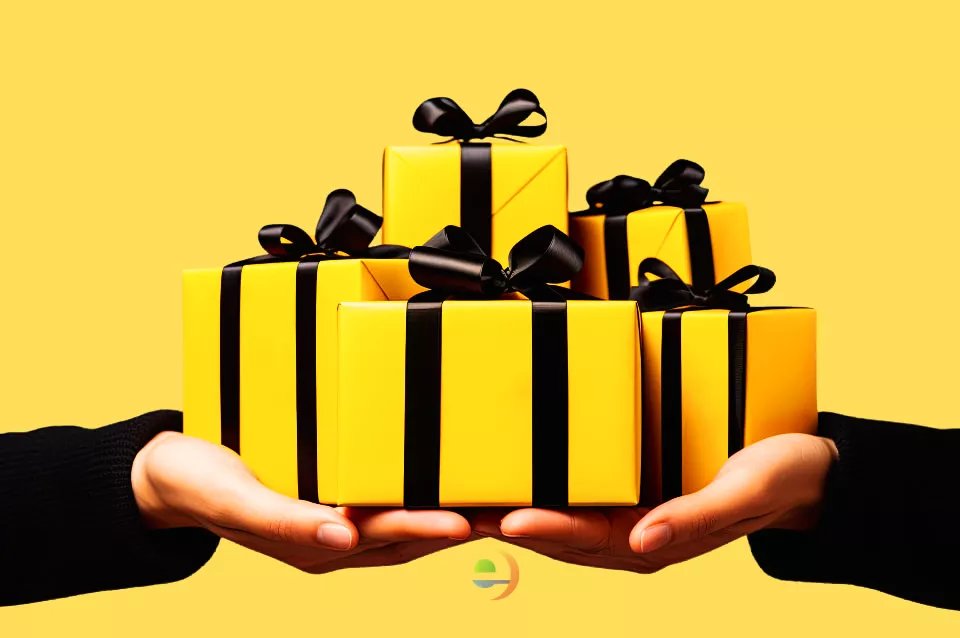 Pacote de Presentes oferecido por duas mãos como exemplo do desconto de 75% para a compra da Loja de Dropshipping pronta para vender em 15 dias.