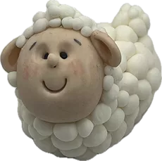 Aprenda a modelar essa ovelha deitada com suas bochechas rosadas no Curso Meu Primeiro Zoológico - Modele 25 Animais em Pasta Americana