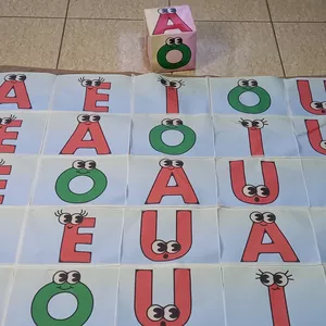 Imagem de capa para o Ebook TAPETE DAS VOGAIS + DADO