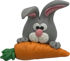 Aprenda a modelar essa cabeça de coelho com uma cenoura para topos de cupcakes no Curso Meu Primeiro Zoológico - Modele 25 Animais em Pasta Americana