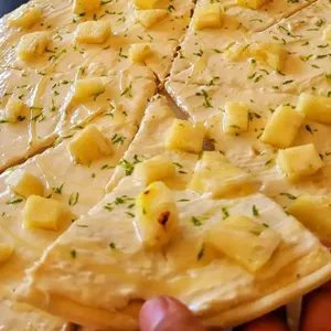 Imagem de capa para o Ebook Receita de pizza de chocolate branco com abacaxi 