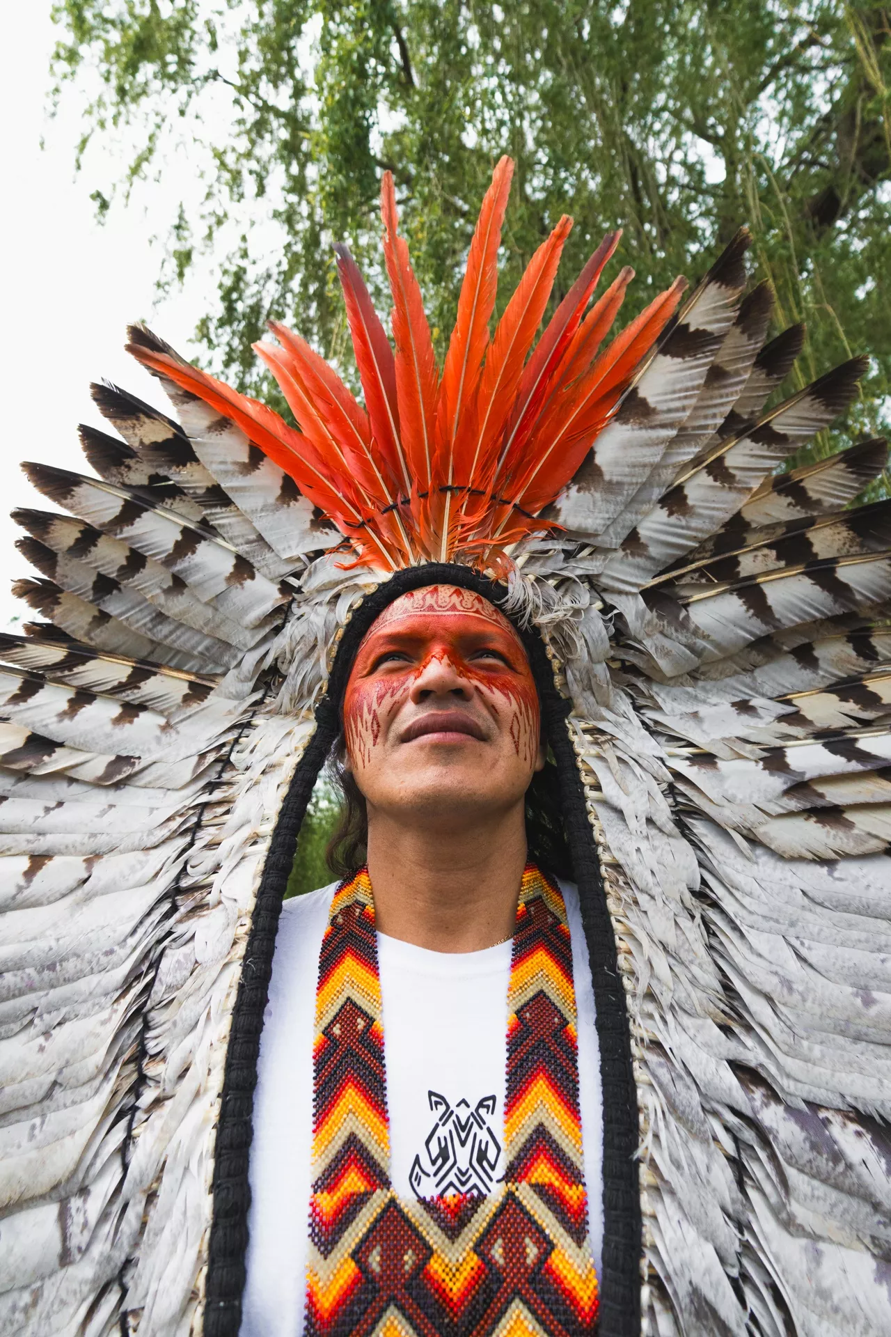 Shaneihu Yawanawá wearing a traditional headdress; Yawanawá leader and chants teacher.