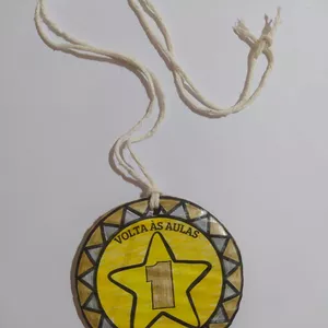 Imagem de capa para o Ebook Medalha volta às aulas.